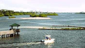 Boat in Lake Worth Lagoon Estuary near restored habitat