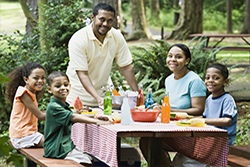 family at picnic table