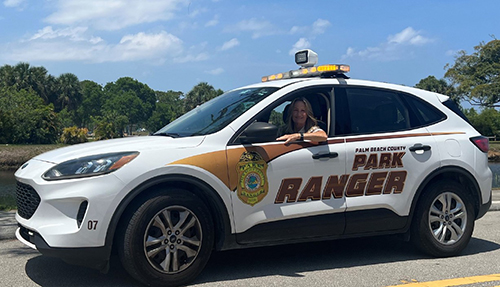 park ranger in park ranger car
